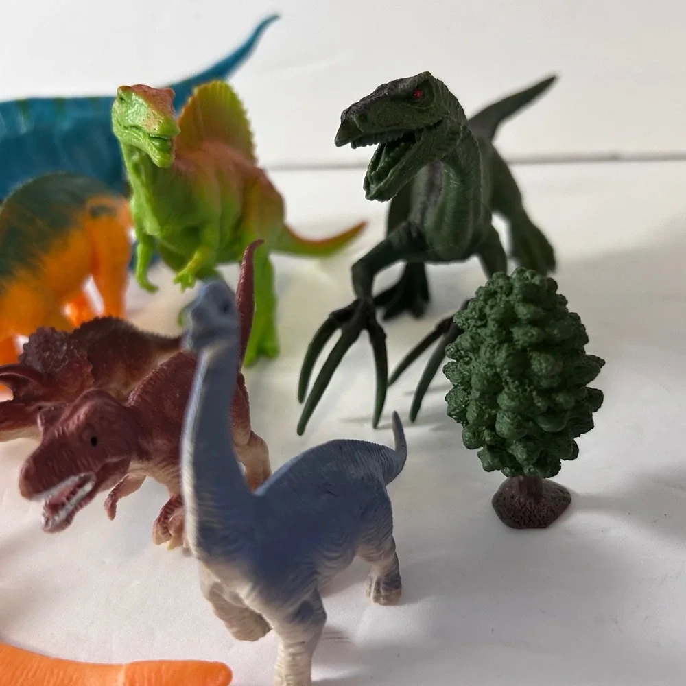 UsedAssorted Plastic Dinosaur Figures Lot of 9 with Tree Toy Prehistoric Animals